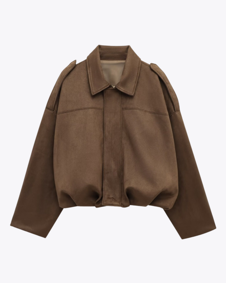 Oversized Damenjacke mit Reißverschluss, Stehkragen und Gummizugsaum in cleanem urbanem Design.
