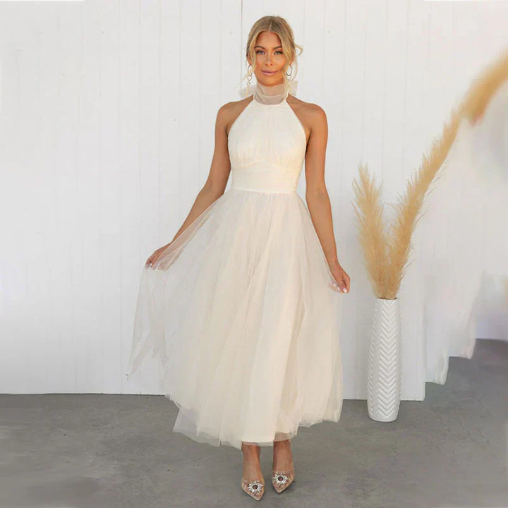 Aleena creme elegantes Feen-Kleid für Damen, mit weichem Creme-Ton und märchenhaftem Design für einen zarten, raffinierten Look