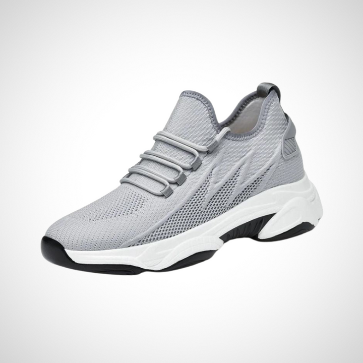Stylische orthopädische Schuhe für Herren in Grau, entwickelt für Komfort und Unterstützung mit einem modernen Look.
