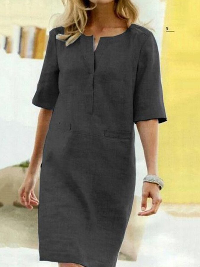Schwarzes Leinenkleid mit lockerer Passform und Taschen – vielseitig kombinierbar