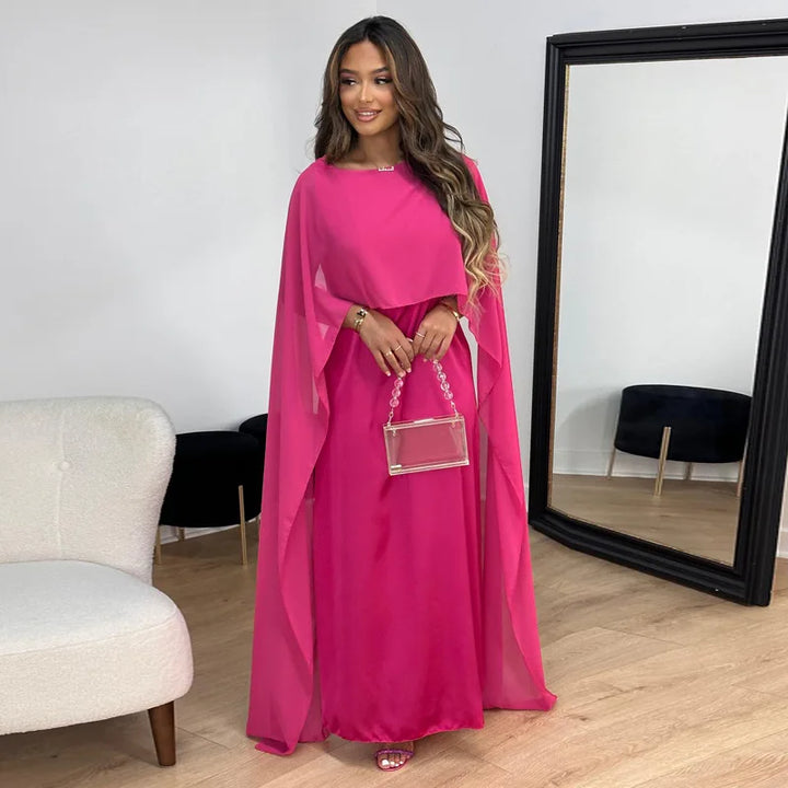 Anneli elegantes fließendes Kleid für Damen in Rosa, mit einem glamourösen Design, ideal für Hochzeiten und luxuriöse Veranstaltungen mit seiner lebendigen Farbe