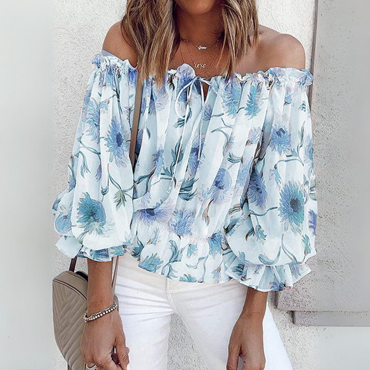 Atmungsaktive Sommerbluse für Damen in Blau – luftige Damenbluse mit lockerem Schnitt für warme Sommertage.