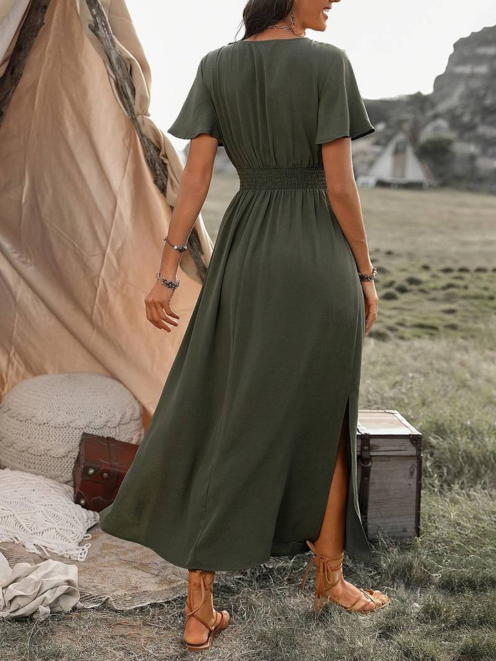Atmungsaktives Midikleid mit V-Ausschnitt mit Kragen, elastischer Taille mit Bindegürtel und seitlichem Schlitz Damen Midikleid hinten