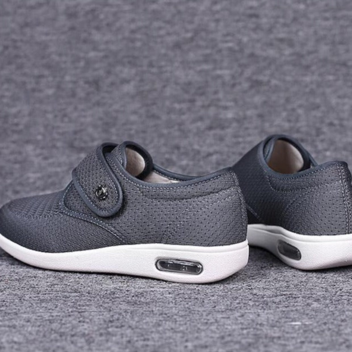 Berlene stylische breite orthopädische Schuhe für Damen in Grau, kombinieren Stil mit orthopädischem Komfort und Unterstützung.

