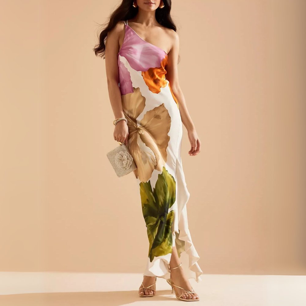 hristella rosa Ein-Schulter-Maxikleid mit lebhaften floralen Akzenten, das eine anmutige und schmeichelhafte Passform zeigt
