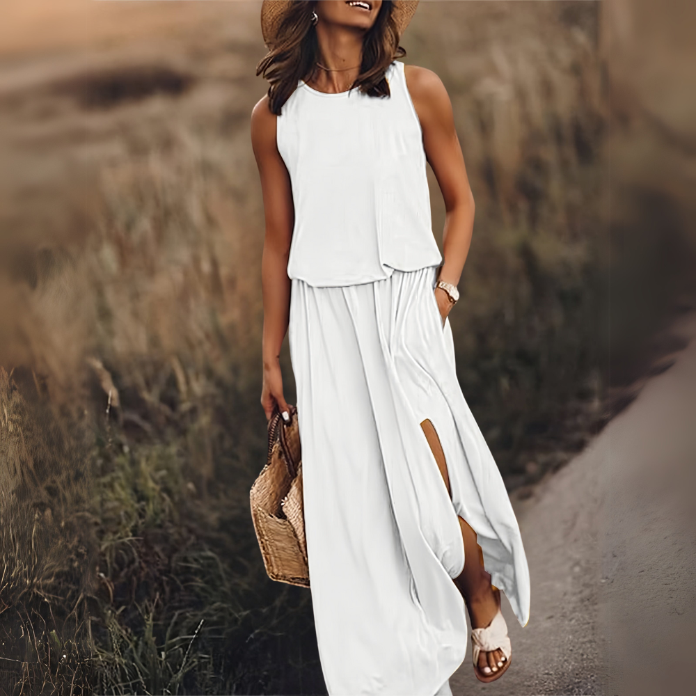 Clarine schmeichelhaftes Maxikleid für Damen in Weiß, bietet ein klassisches und elegantes Design, perfekt für Hochzeiten, Galas und andere formelle Zusammenkünfte.