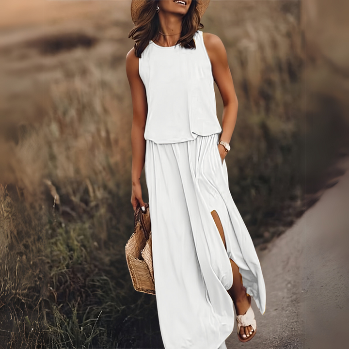 Clarine schmeichelhaftes Maxikleid für Damen in Weiß, bietet ein klassisches und elegantes Design, perfekt für Hochzeiten, Galas und andere formelle Zusammenkünfte.