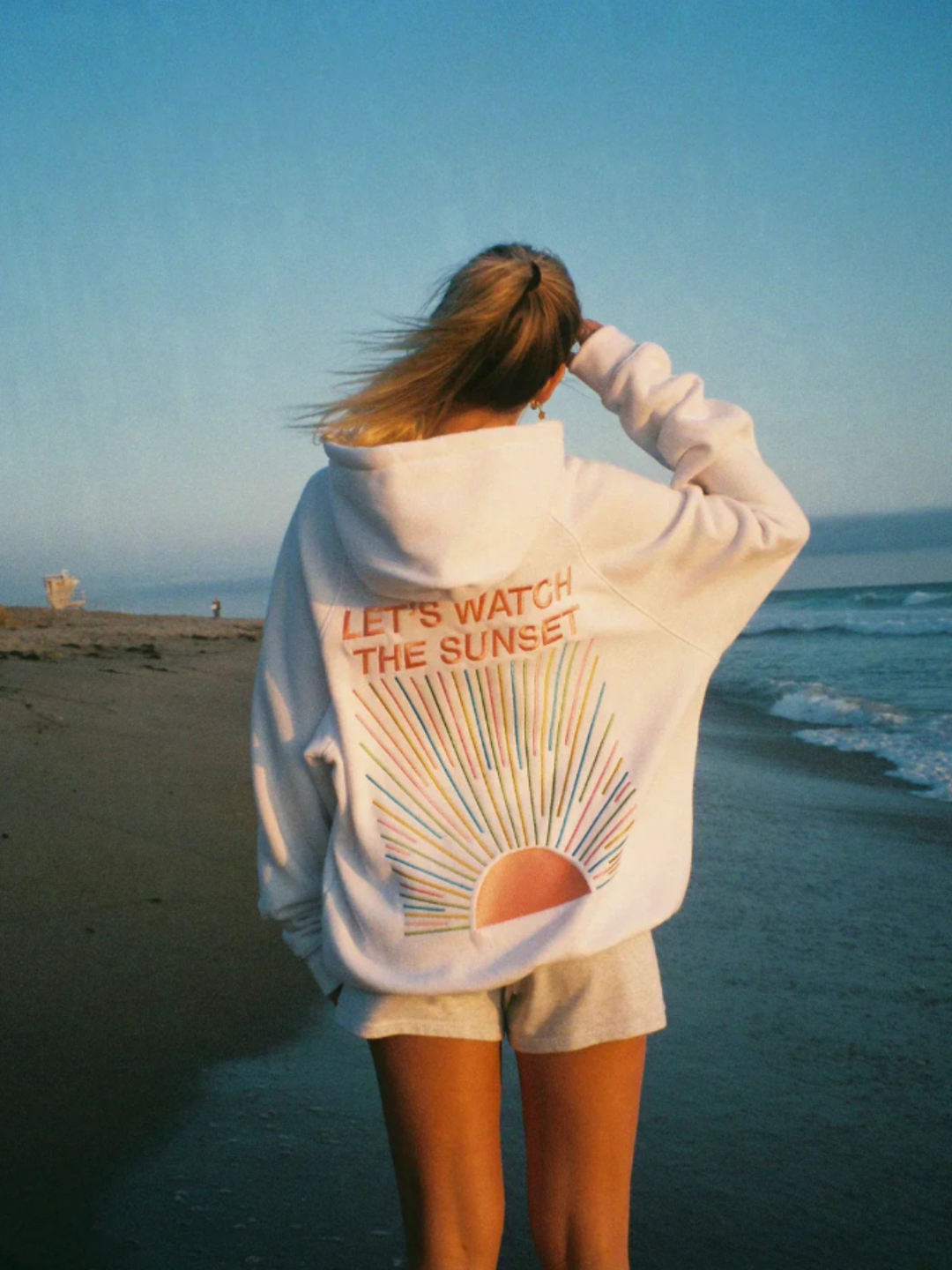 Damen Hoodie mit Sonnenmotiv auf dem Rücken und Rippbündchen