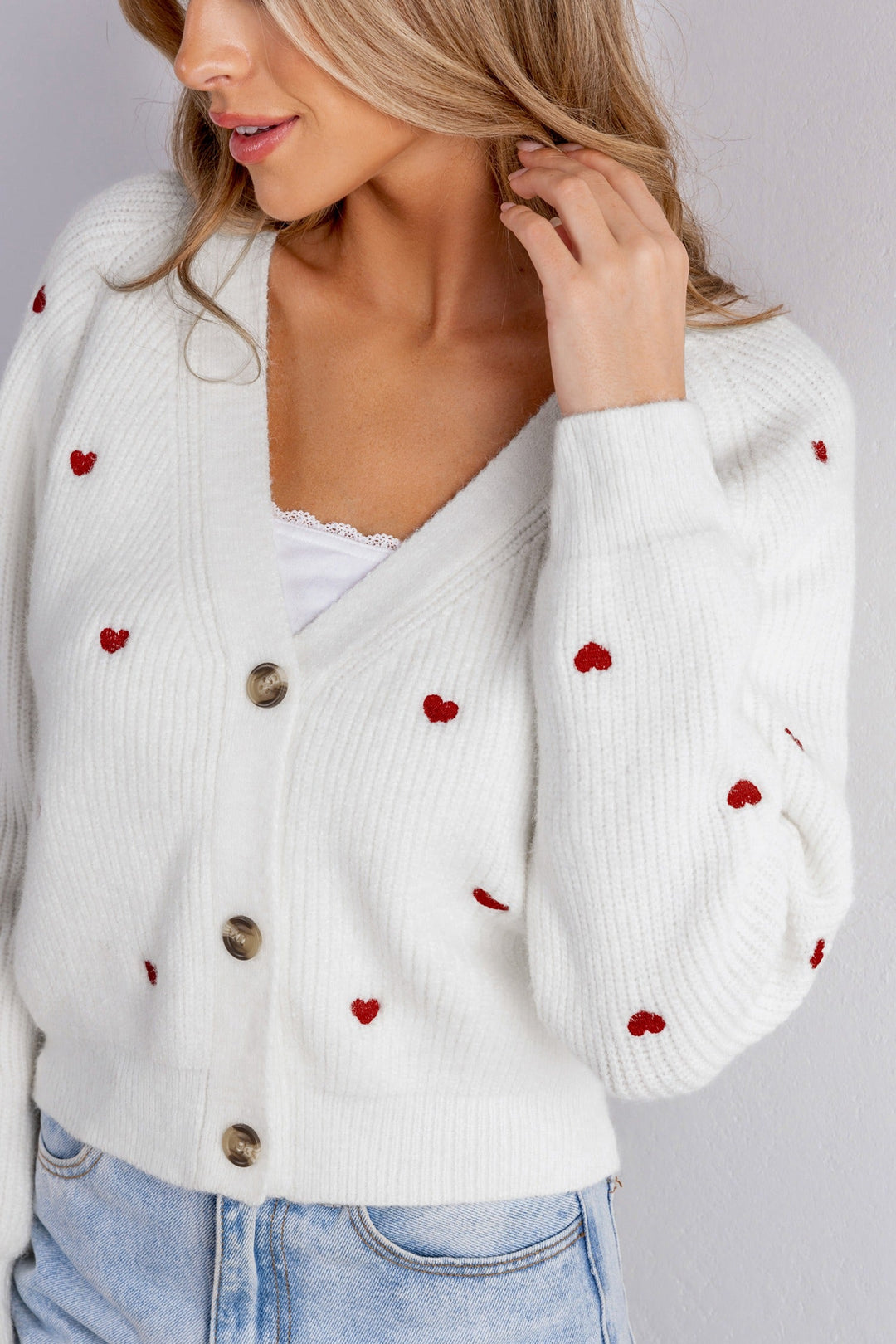Damen Langarm-Cardigan mit V-Ausschnitt und Herzmotiven