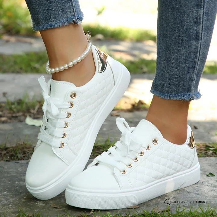 Damen-Sneaker mit diamantgesteppten Seiten und flacher Außensohle