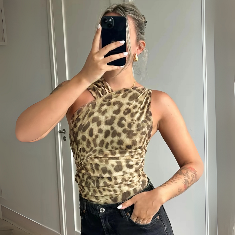 Dorotea Trendiger Leoparden-Body für Damen, mit schlanker Passform und auffälligem Leopardenmuster, perfekt für lässige und stilvolle Outfits.