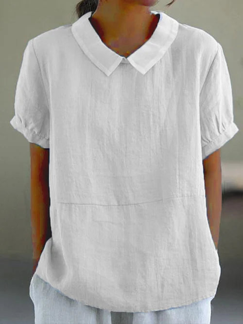 Klassische weiße Bluse mit entspannter Passform und Kragen für Frauen, die Vielseitigkeit und Stil für jede Gelegenheit bietet. Weicher, atmungsaktiver Stoff sorgt für Komfort den ganzen Tag.