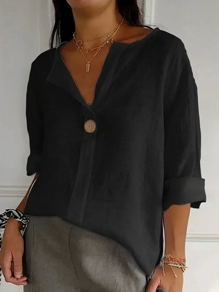 Fredrika schwarze elegante Leinenbluse für Damen, mit schlankem schwarzem Design, ideal für legere und formelle Anlässe