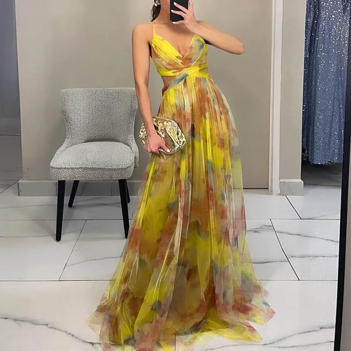 Gelbes Maxikleid mit V-Ausschnitt und freiem Rücken – leuchtend, verspielt und elegant
