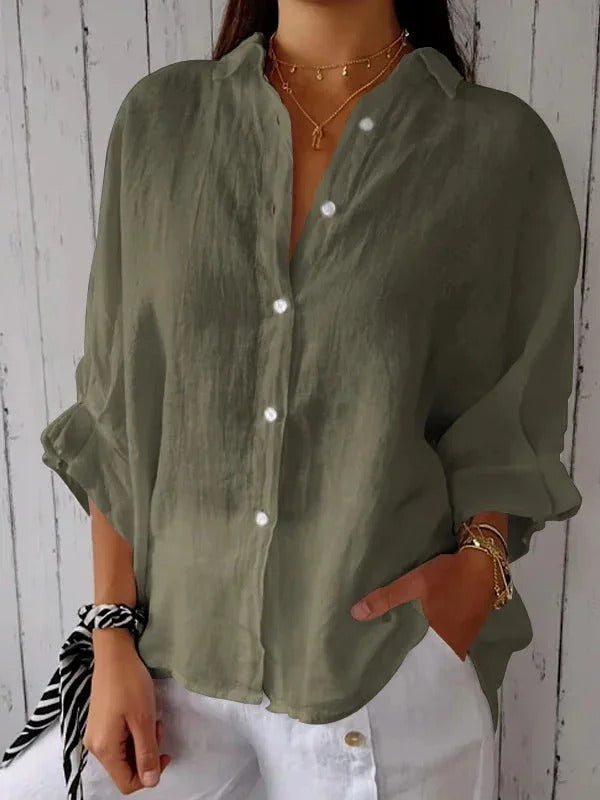 Elegante grüne Baumwoll-Leinen-Bluse für Damen, perfekt für ein frisches und entspanntes Outfit, das sowohl Komfort als auch Stil bietet.
