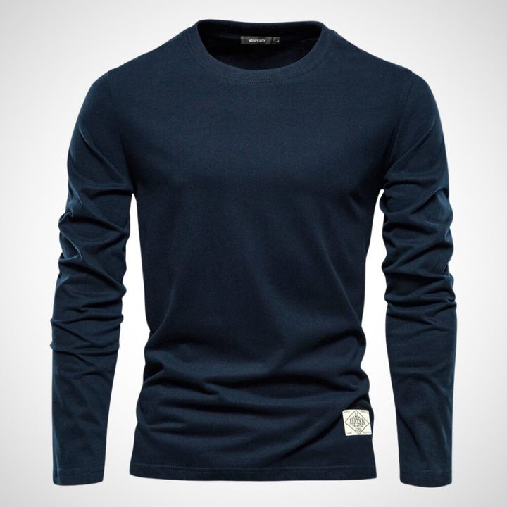 Langarmshirt in Marineblau mit klassischem Rundhalsausschnitt, atmungsaktivem Baumwollmaterial und schlichten, einfarbigen Design für Herren.