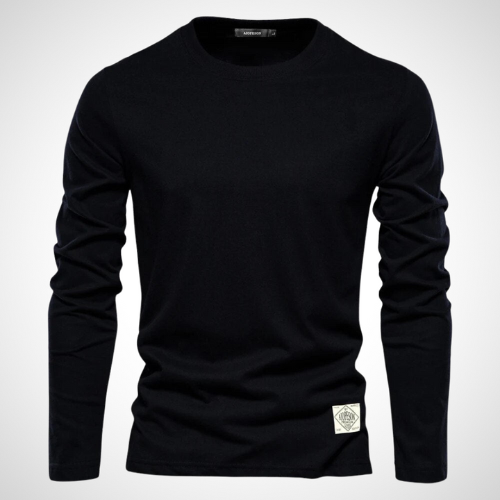 Langarmshirt in Schwarz mit klassischem Rundhalsausschnitt, atmungsaktivem Baumwollmaterial und schlichten, einfarbigen Design für Herren.