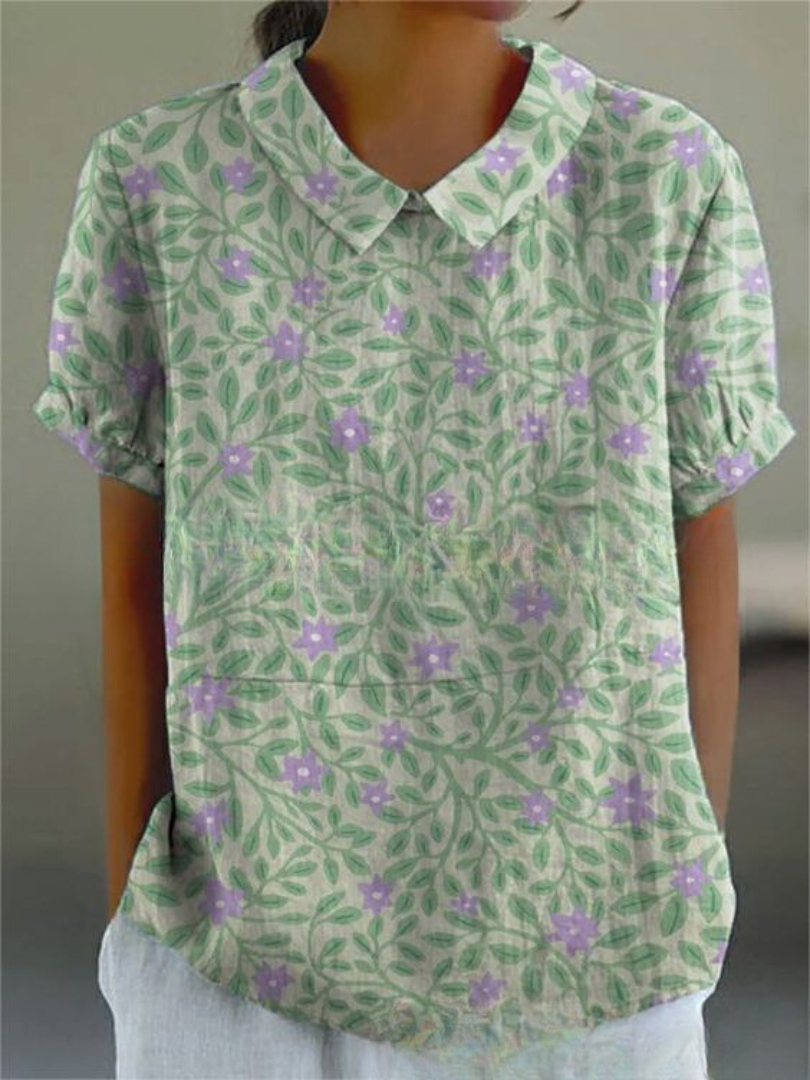 Frisches grünes Blumenmusterbluse für Damen, das einen lebendigen und naturinspirierten Look bietet, perfekt für Frühlings- und Sommeroutfits