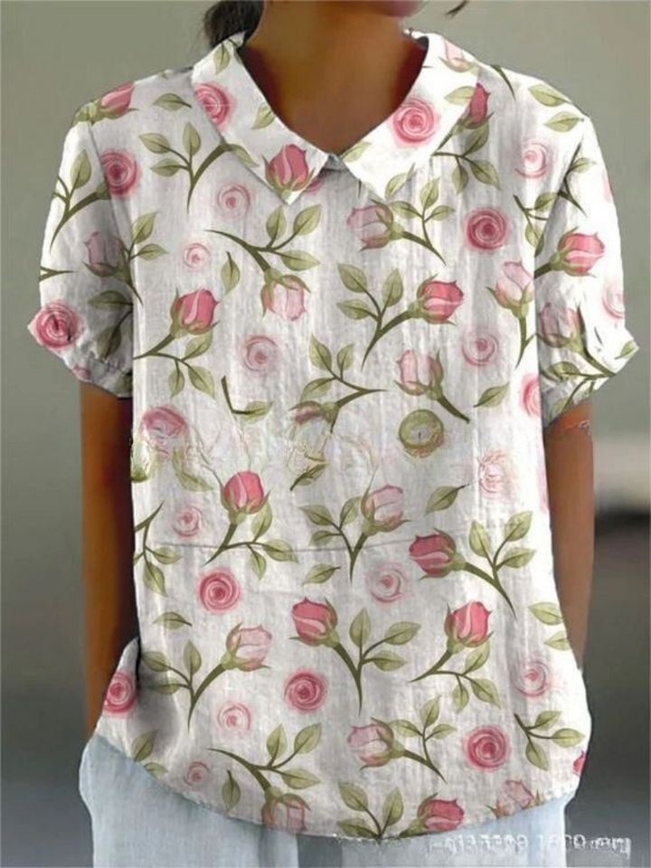Sanftes pinkes Blumenmusterbluse für Damen, perfekt, um deinem legeren oder halbformellen Look einen Hauch von Weiblichkeit und Farbe zu verleihen