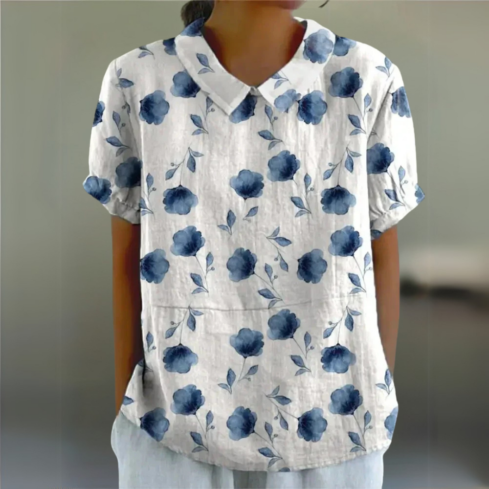 Dunkelblaue Damenbluse mit kräftigem Blumenmuster – stilvolle Blumenmuster-Bluse mit Kontrast