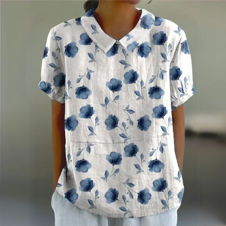 Dunkelblaue Damenbluse mit kräftigem Blumenmuster – stilvolle Blumenmuster-Bluse mit Kontrast