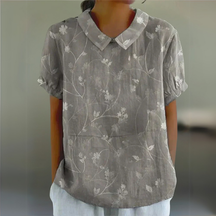 Graue Damenbluse mit dezentem Blumenmotiv – elegante Blumenmuster-Bluse für den Alltag