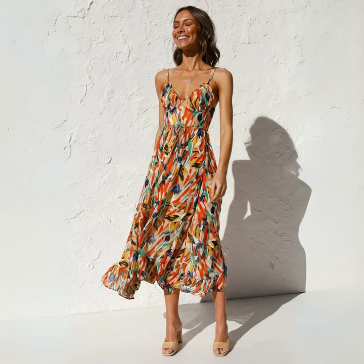 Midikleid mit fließendem A-Linien-Schnitt, farbenfrohem Allover-Print und dünnen Trägern in Orange-Grün für Damen.