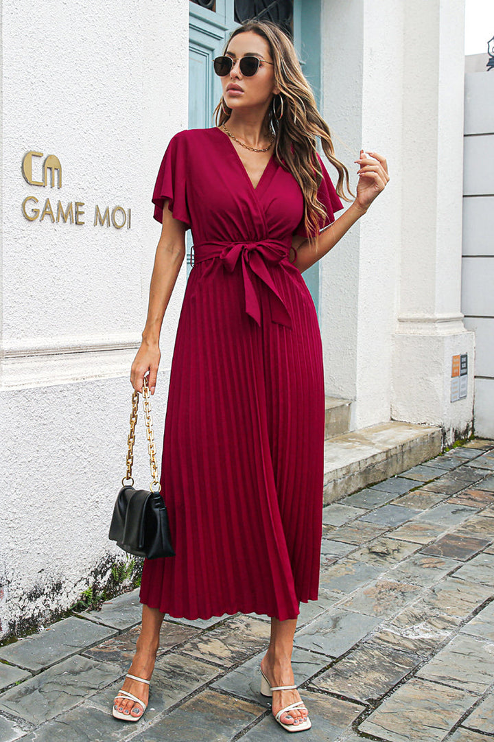 Elegante abito midi plissettato con cintura in vita per donna