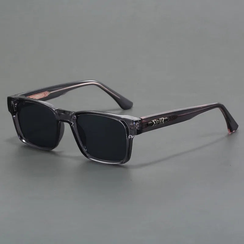 Coole quadratische Unisex-Sonnenbrille in Grau mit minimalistischem Stil und robustem Gestell
