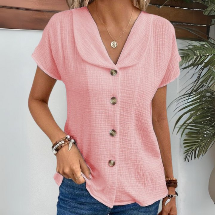 Zartes rosa Damentop mit Knöpfen und Raffiniertes Kurzarm Design – feminin, bequem und vielseitig kombinierbar.