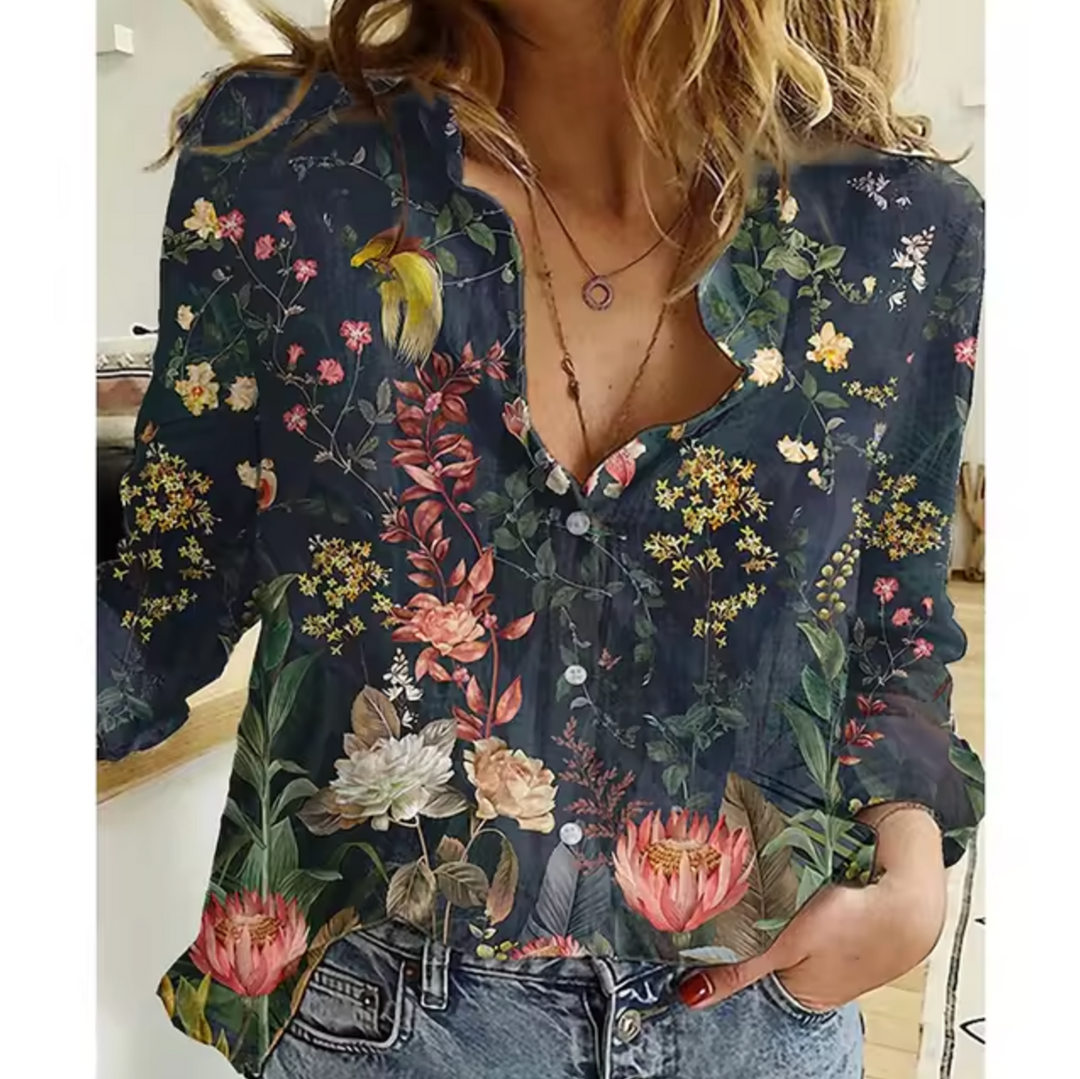Schwarz-grüne Damenbluse mit auffälligem Blumenmuster besondere Blumenmuster-Bluse für markante Looks