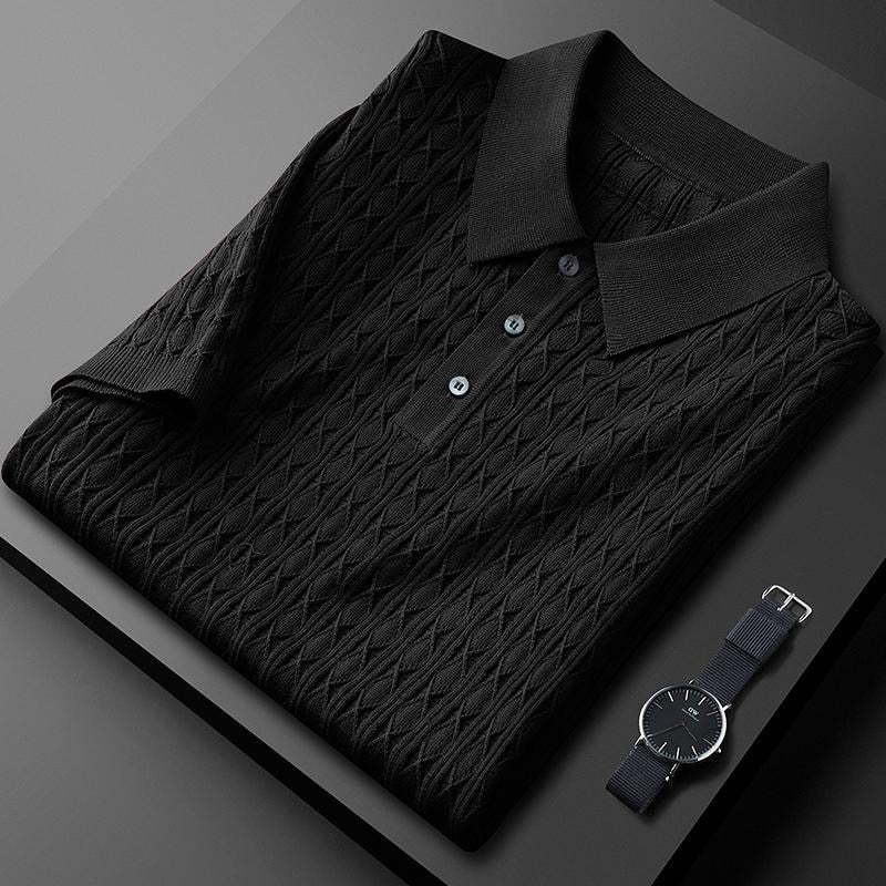 Schwarzes Herren-Poloshirt gefaltet mit Premium-Finish als Atmungsaktives Premium-Poloshirt
