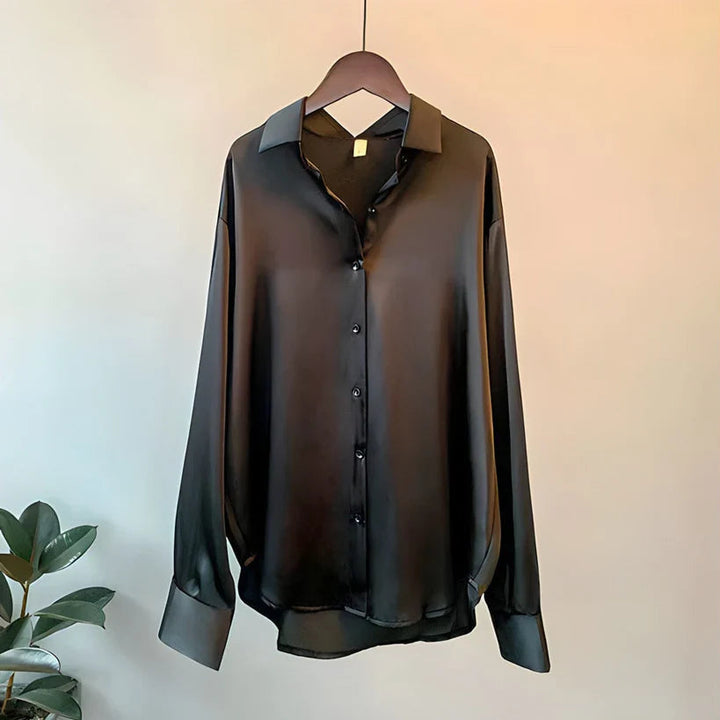Moderne schwarze Damenbluse als stilvolle Langarm-Seidenbluse mit edlem Glanz für den Alltag