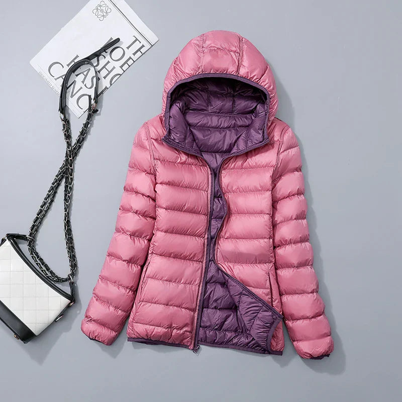 Steppjacke für Damen in Helllila Rose mit warmer Kapuze, praktischem Reißverschluss und Wendefunktion