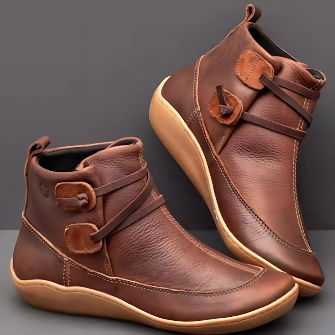 Stiefel mit strukturierter Schulterpartie, tailliertem Schnitt und funktionalem Reißverschlussdesign für Damen.