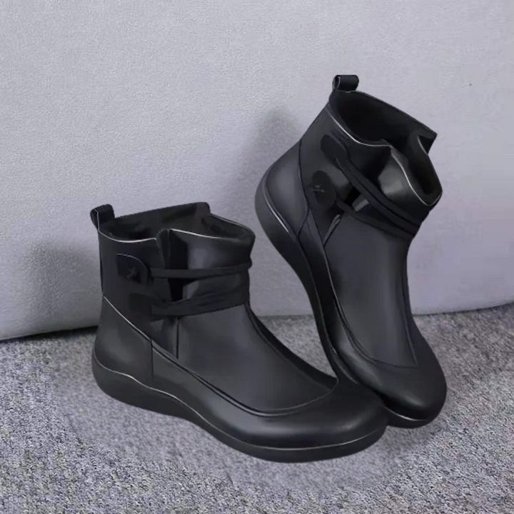 Stiefel mit strukturierter Schulterpartie, tailliertem Schnitt und funktionalem Reißverschlussdesign für Damen.