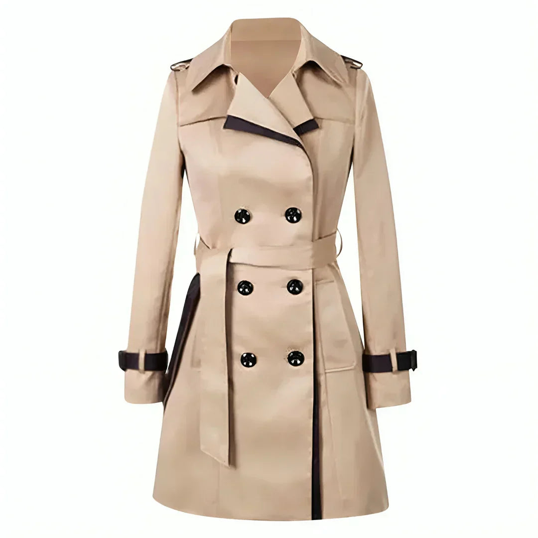 guertel-damen	Trenchcoat mit markantem Kontrastbesatz, verstellbarem Taillengürtel und klassischer doppelreihiger Knopfleiste für Damen.