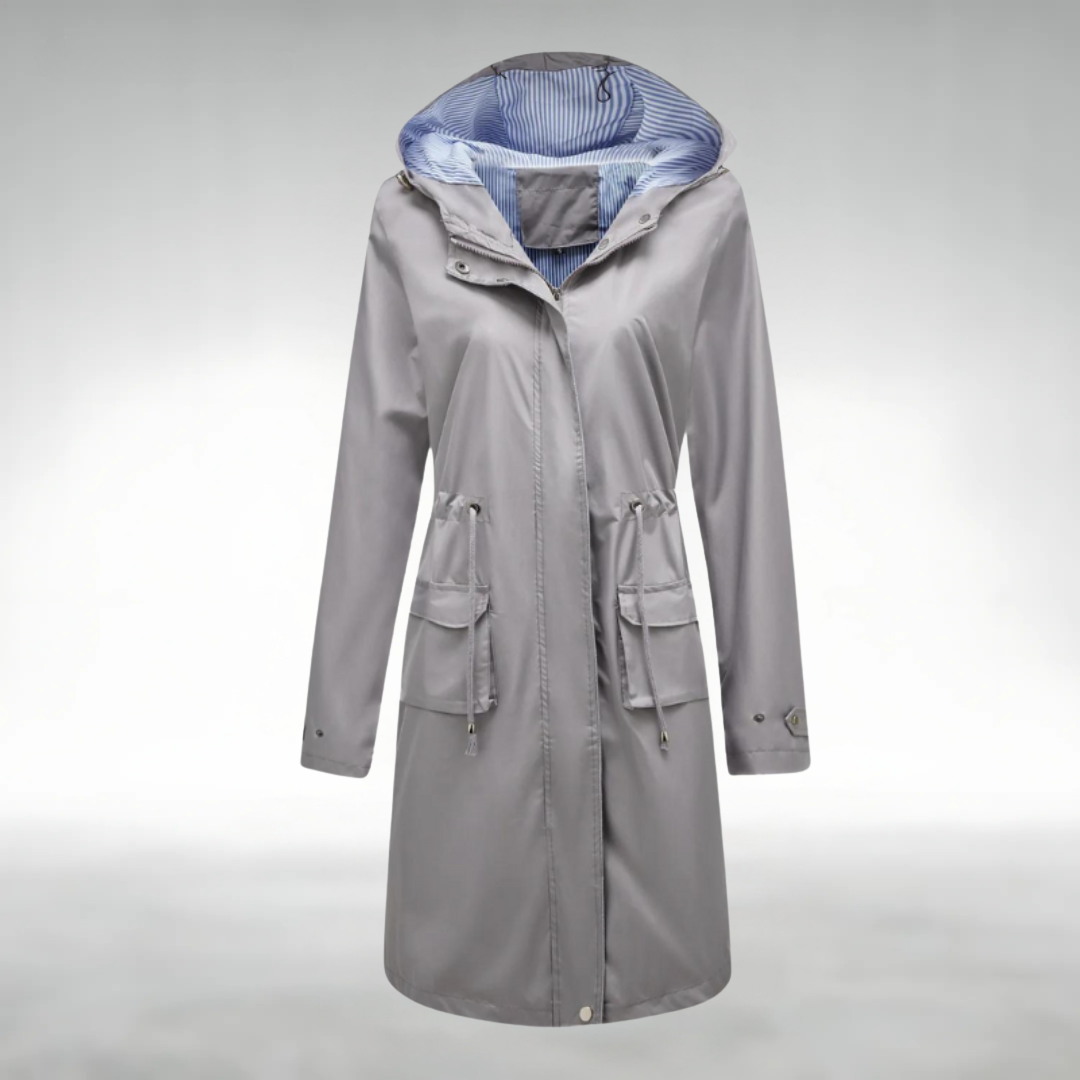 Trenchcoat in Grau mit wasserdichtem Design, winddichter Funktion und verstellbaren Kapuze für Damen.