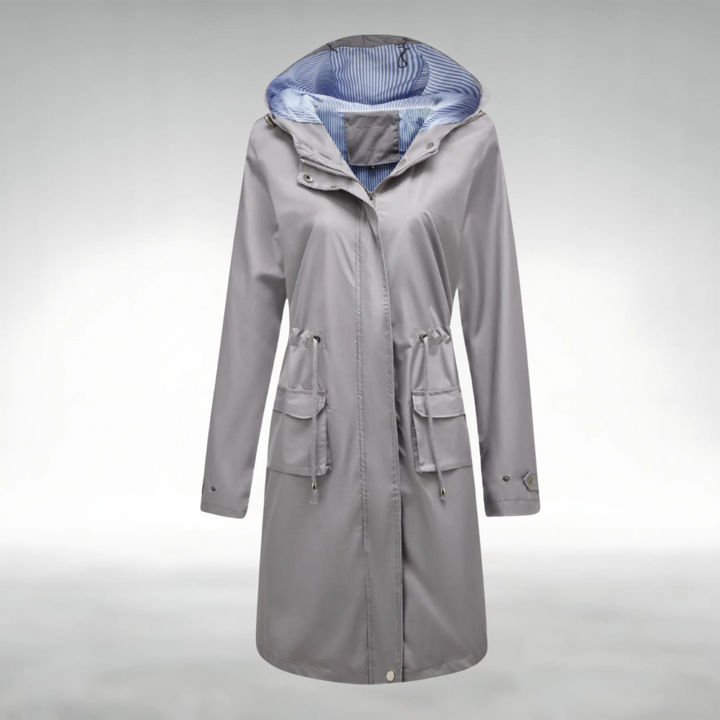 Trenchcoat in Grau mit wasserdichtem Design, winddichter Funktion und verstellbaren Kapuze für Damen.