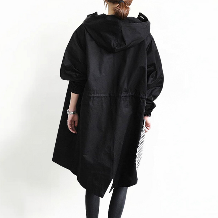 Trenchcoat in Schwarz mit wasserabweisender Oberfläche, weiten Ärmeln mit Gummizug und praktischer Kapuze für Damen.