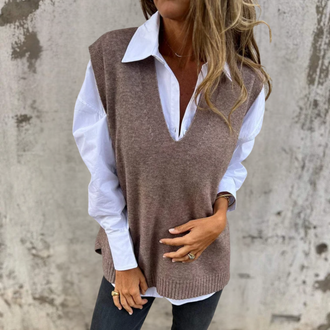 Grau-braune Weste für Damen mit tiefem V-Ausschnitt, Rippbündchen und ärmellosem Stil.